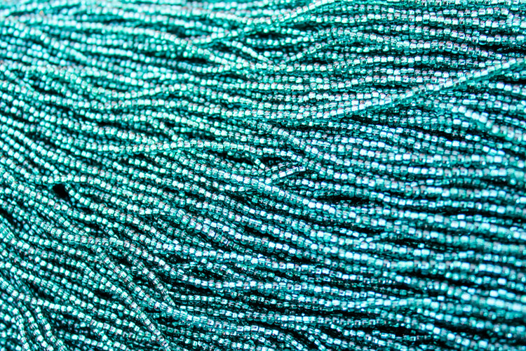 11/0 SILVER LINED PEACOCK BLUE