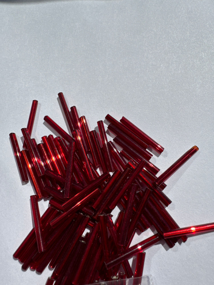 BURNT RED TRANSPARENT SILVER LINED - 20MM BUGLE BEADS