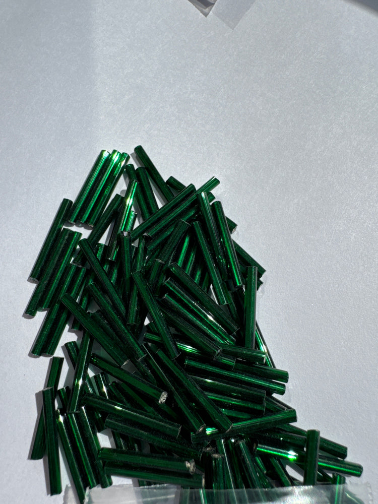 DARK EMERALD TRANSPARENT SILVER LINED - 20MM BUGLE BEADS