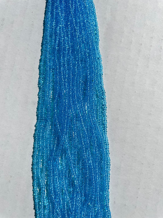 11/0 TRANSP. TURQUOISE BLUE SEED BEADS