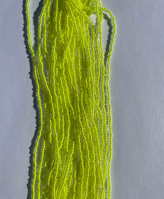 11/0 UV Crystal/Neon Yellow UV-Lined Seed Beads