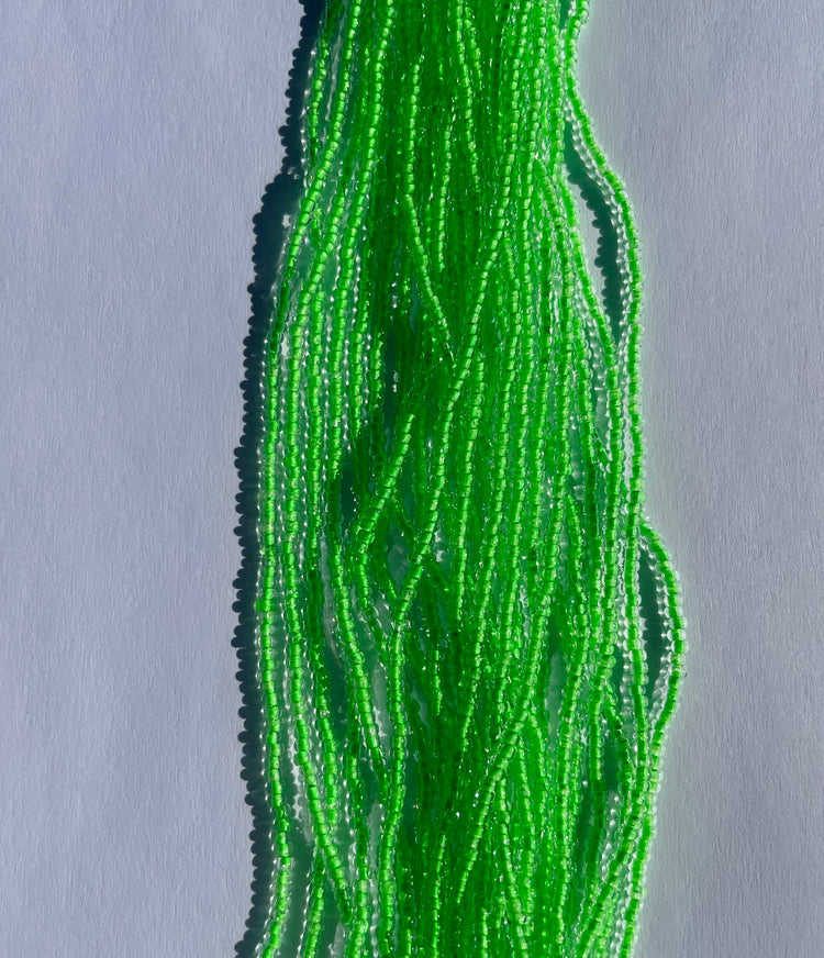 11/0 UV Crystal/Neon Green UV-Lined Seed Beads