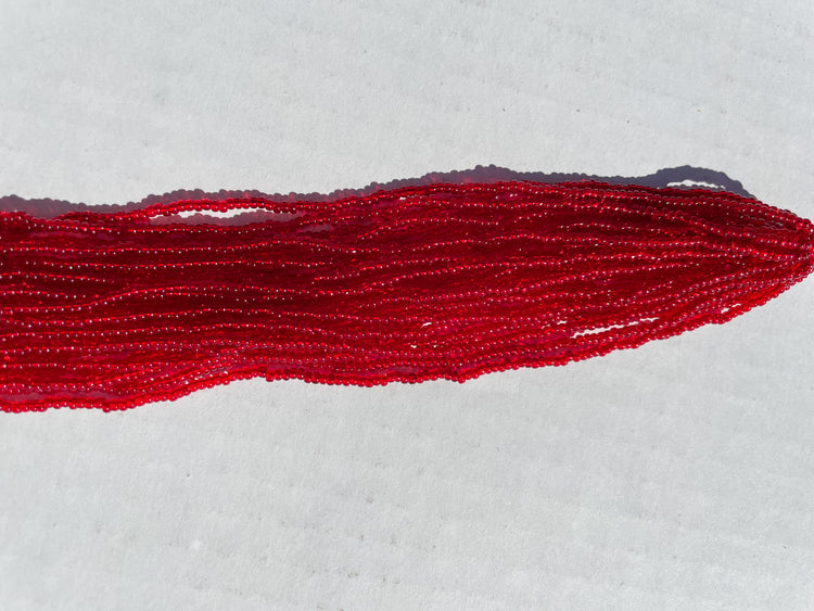 11/0 TRANSP. DARK RED SEED BEADS