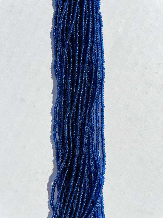 11/0 TRANSP. DK MONTANA BLUE SEED BEADS