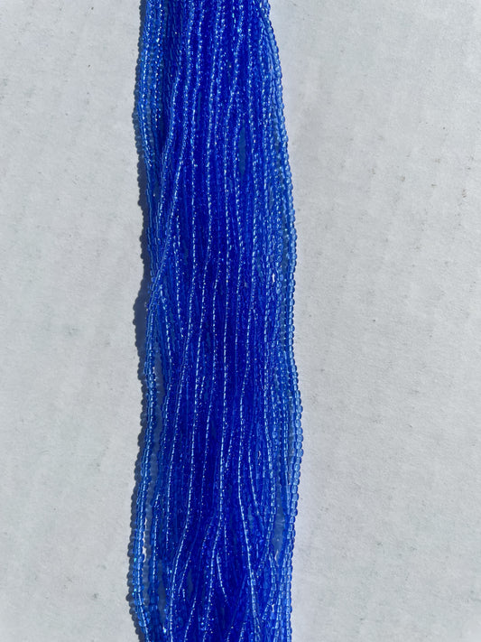 11/0 TRANSP. MEDIUM BLUE SEED BEADS