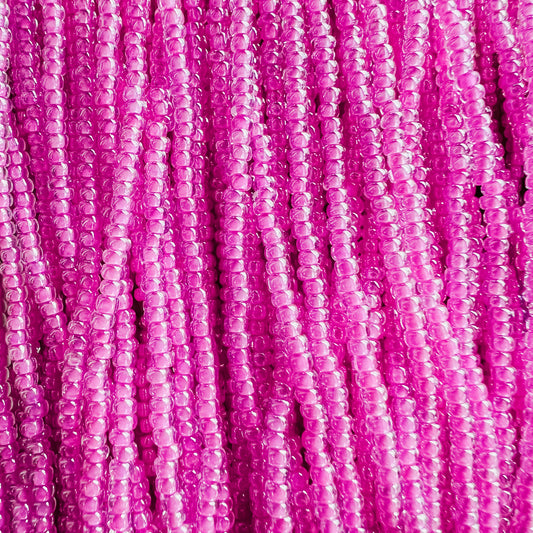 11/0 CRYSTAL DEEP PINK LINED SEED BEADS