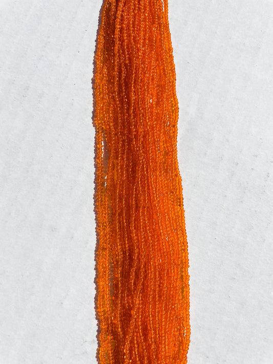 11/0 TRANSP. ORANGE SEED BEADS