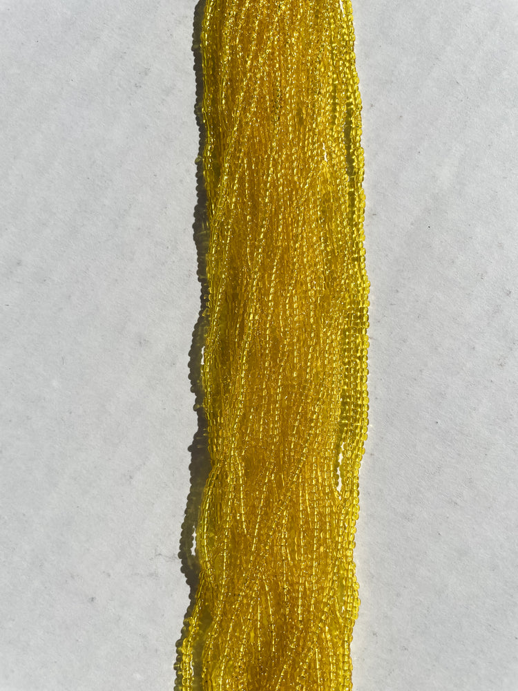 11/0 TRANSP. YELLOW SEED BEADS